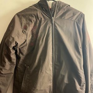 White sierra winter jacket in brown with red flower detailing